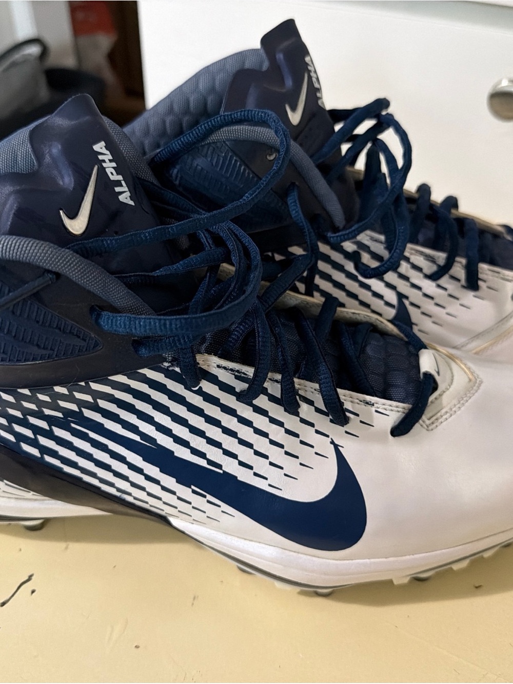 Nike Men's White and Navy Alpha Athletic Cleats